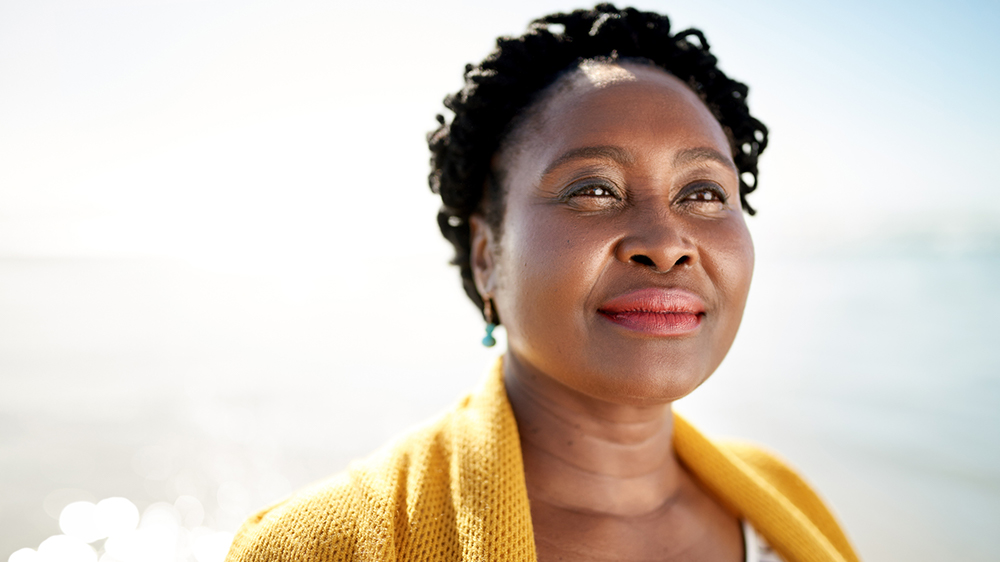 Smiling woman looking into the distance
