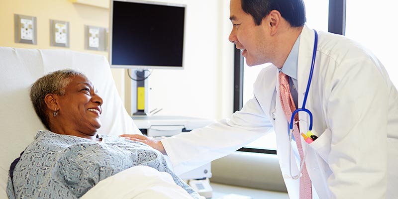 hospitalist doc with patient