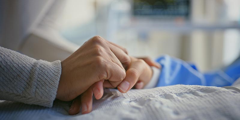 nurse and patient hands