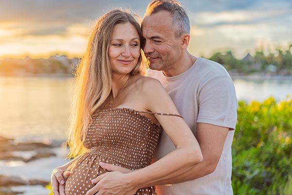pregnant older couple
