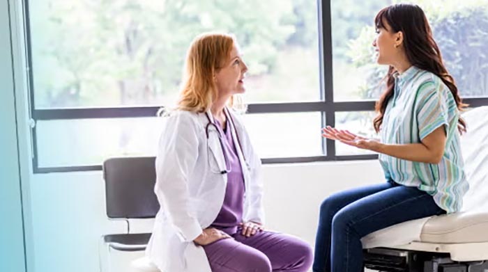 female patient with doctor