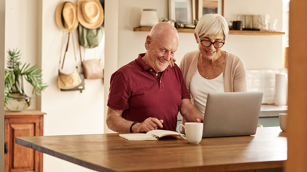 Couple looking at laptop